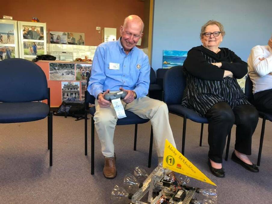 ROBOT: Rotary Club of Port Macquarie's Bob Cleland and Diana Gammon at the showcase.