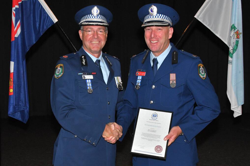 AWARD: Assistant Commissioner Northern Regions Max Mitchell and Detective Inspector Guy Flaherty.