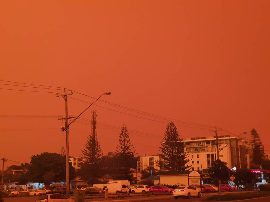 FIRE: The sky across Port Macquarie has turned red as a result of the fire. PHOTO: Laura Telford.