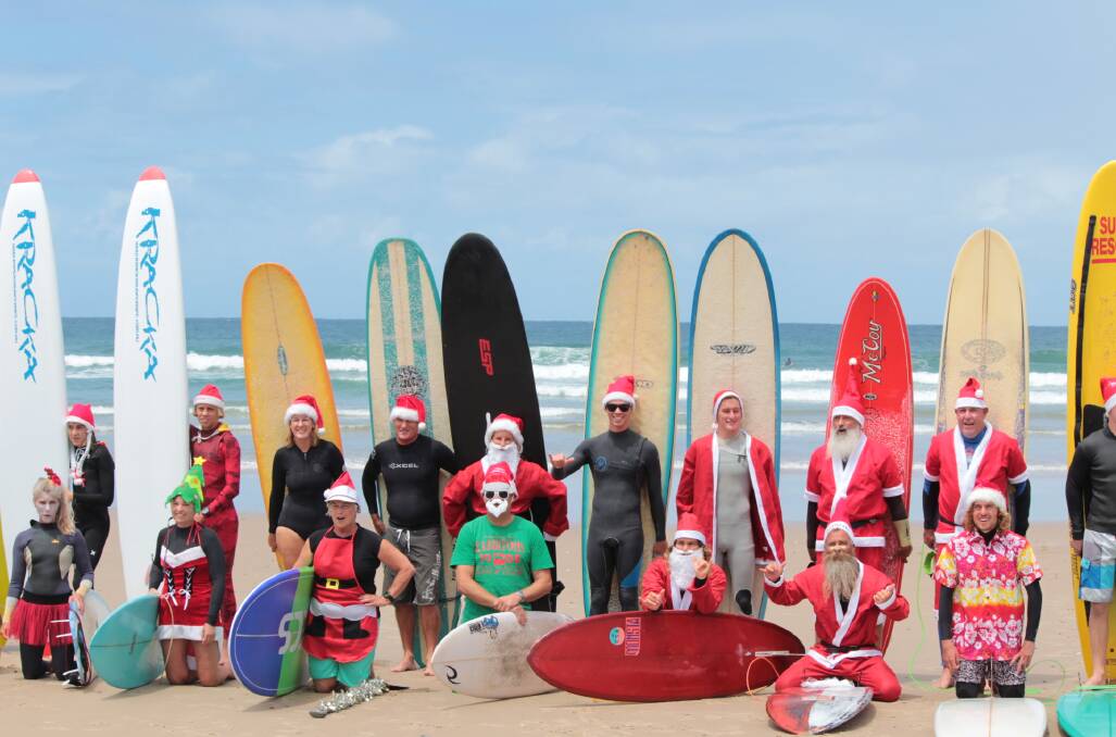 CHRISTMAS: Come along to Rainbow Beach, Bonny Hills on December 22 to see the Surfing Santas in action.