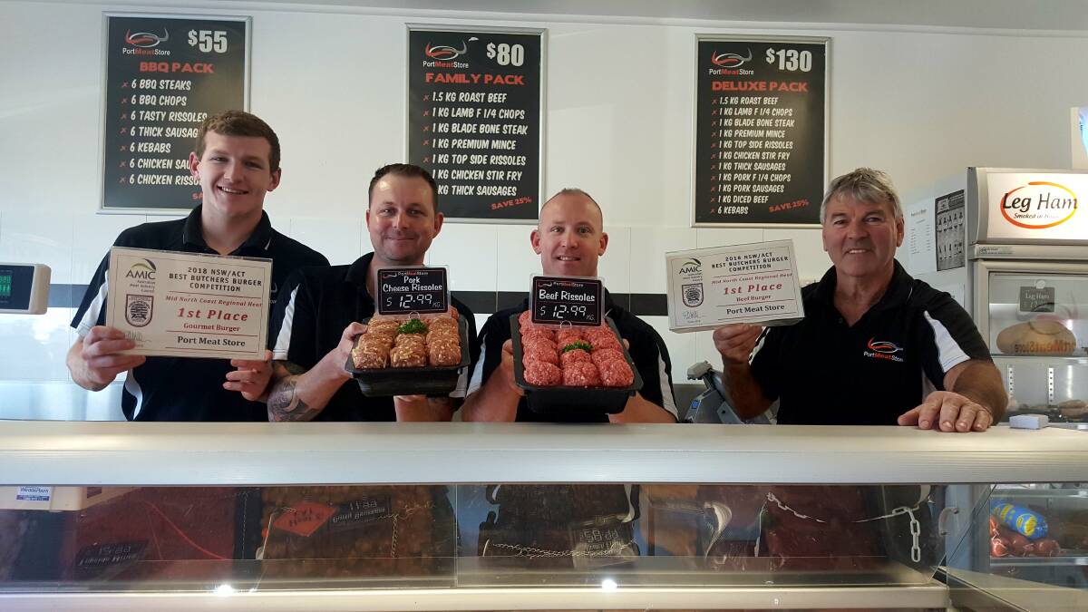BEST BURGERS: Bailey Connor, Rikki Baird, Daniel Johnson and Port Meat Store owner Larry Dickson with their winning burgers. Photo: Laura Telford.