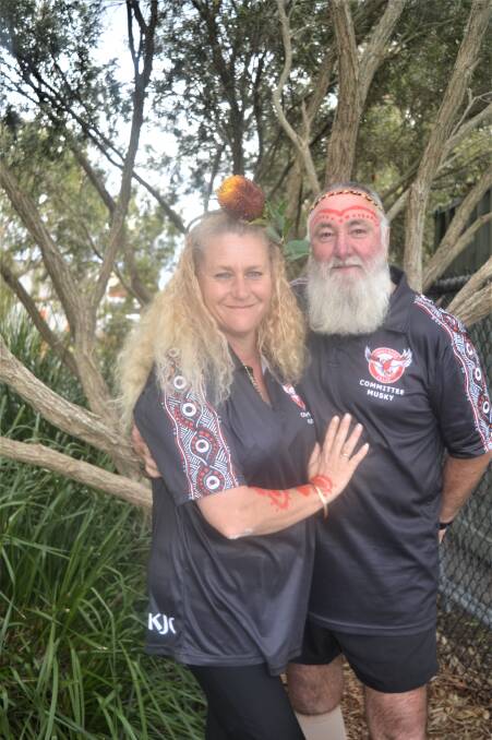 New shirts: Camden Haven Eagles Junior Rugby League treasurer Penny Ashby and president Stuart Ashby wear the new shirts. 