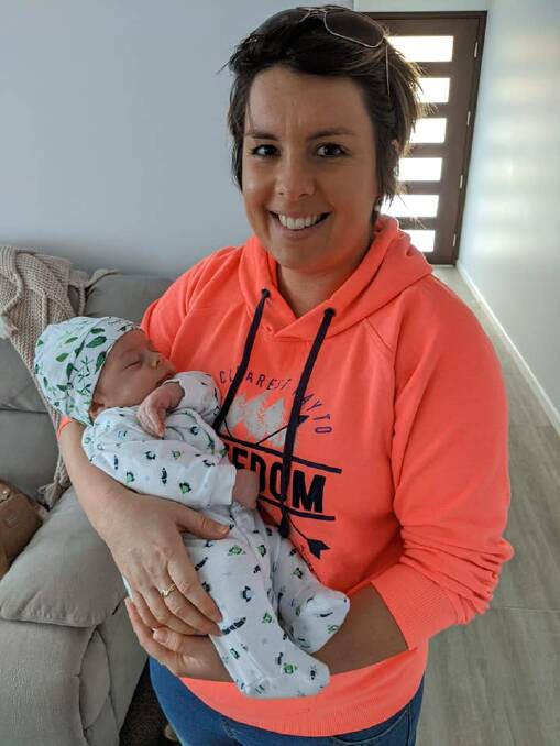 All smiles: Emma Dykes with baby Ryder who made his entrance into the world on May 8. Photo: supplied. 