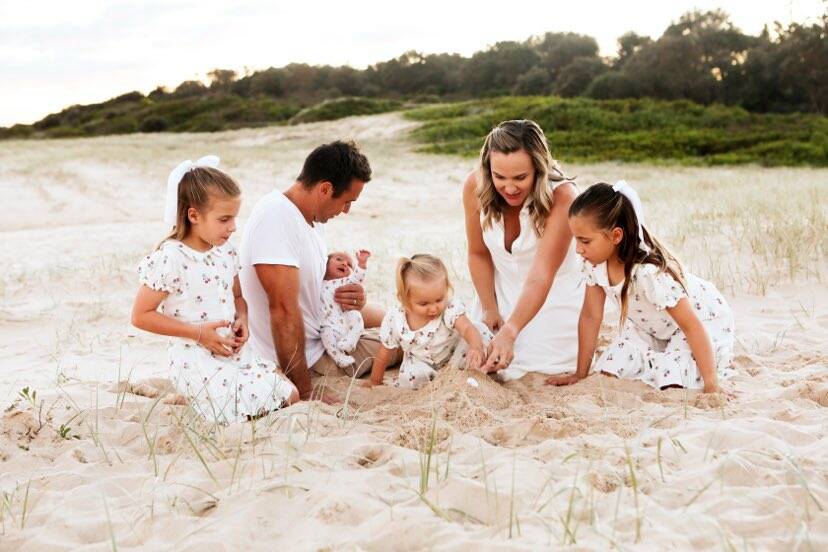 Beautiful family: Imogen, Kiel Bigeni holding baby Bonnie, Ella, Kylie and Brooke. Photo: Sharni Tait Photography.