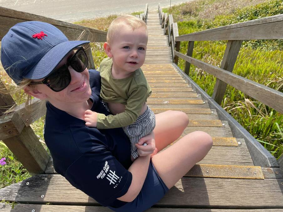 Great cause: Brittany Daly is a Sancrox/Thrumster Rural Fire Brigade volunteer firefighter and has signed up to do the 2021 Firies Climb for MND. Her son Mathew is her biggest fan. 