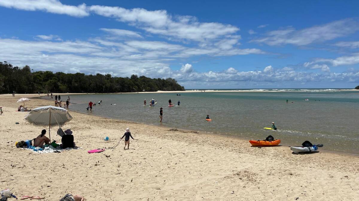 Lake Cathie has been popular with visitors over the summer due to ideal beach conditions and warm water temperatures. Picture by Liz Langdale 