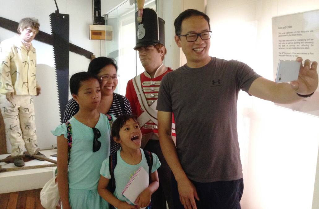 Snap away: The Chong family from Sydney get some selfie practice in at Port Macquarie Museum. Photo: supplied. 