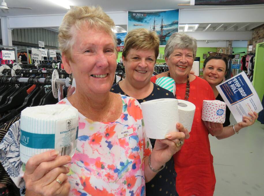Stop, Drop and Roll: Joan Rayward, Wendy Smith, Helen Cornhill and Lisa Willows at the Port Macquarie Central Road Lifeline Shop. 