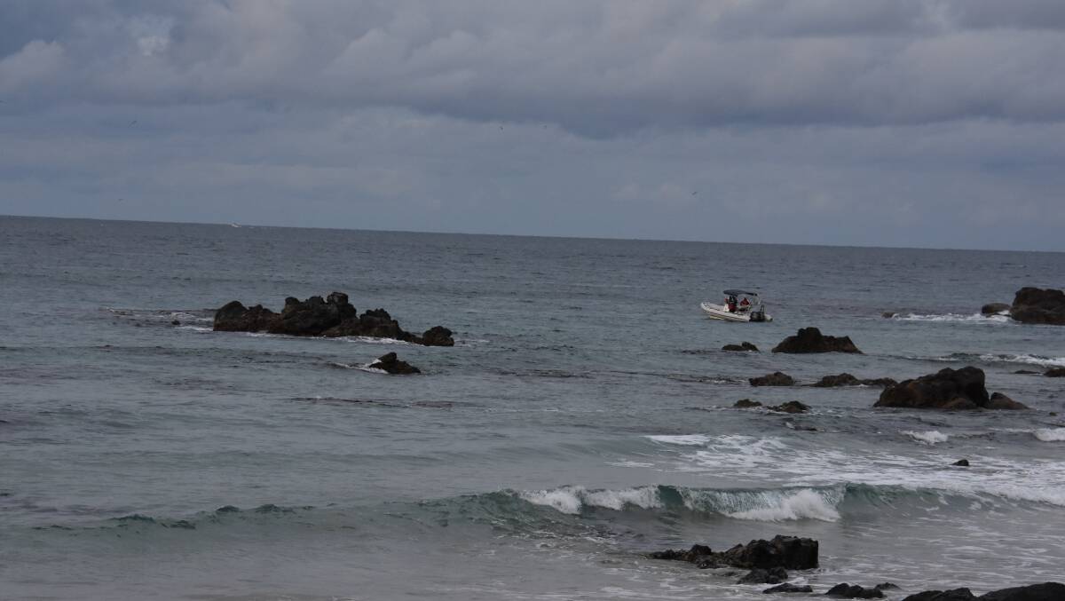 Police divers were alerted to an item at Flynns Beach. The item will be forensically examined. 