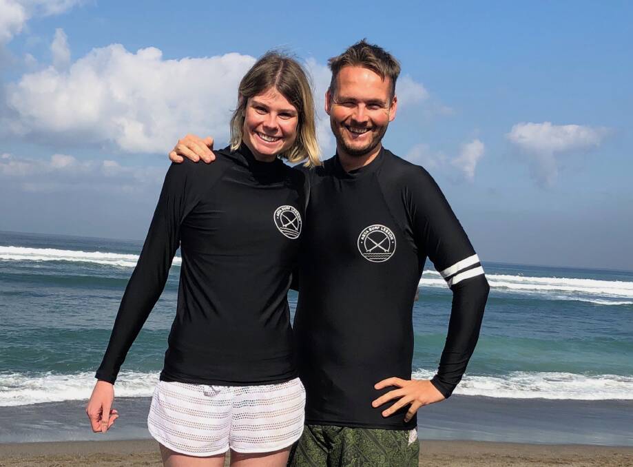 New hobby: The couple learnt how to surf at Bali. Photo: supplied. 