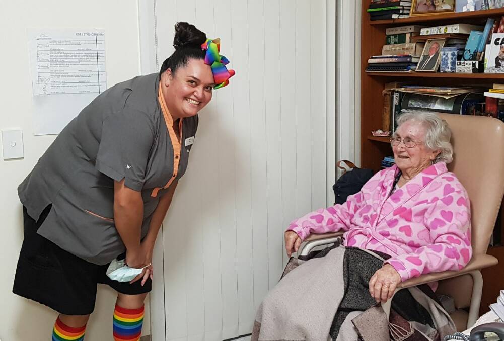 Having a laugh: Kate Slater with Whiddon Laurieton resident Sheila Newman. Photo: supplied. 