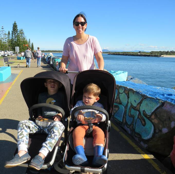 Too narrow: Sarah Sales with her children Louis and Fletcher. Mrs Sales is in favour of the breakwall being upgraded to widen the pathway. 