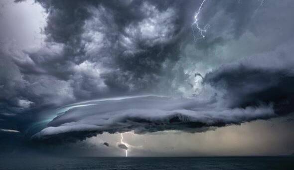 A cracker: Will Eades' photograph of the storm in Port Macquarie will appear in the Australian Bureau of Meteorology's 2020 calendar. 