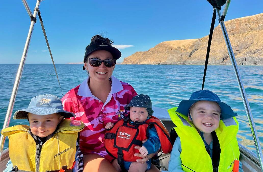 Elenya Dixon and the three boys love getting out on the boat for a fish. Picture: supplied. 