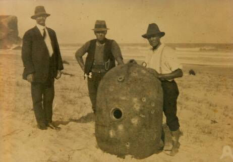 Albert Eggins & Harry Seaman with the mine in the Camden Haven. 