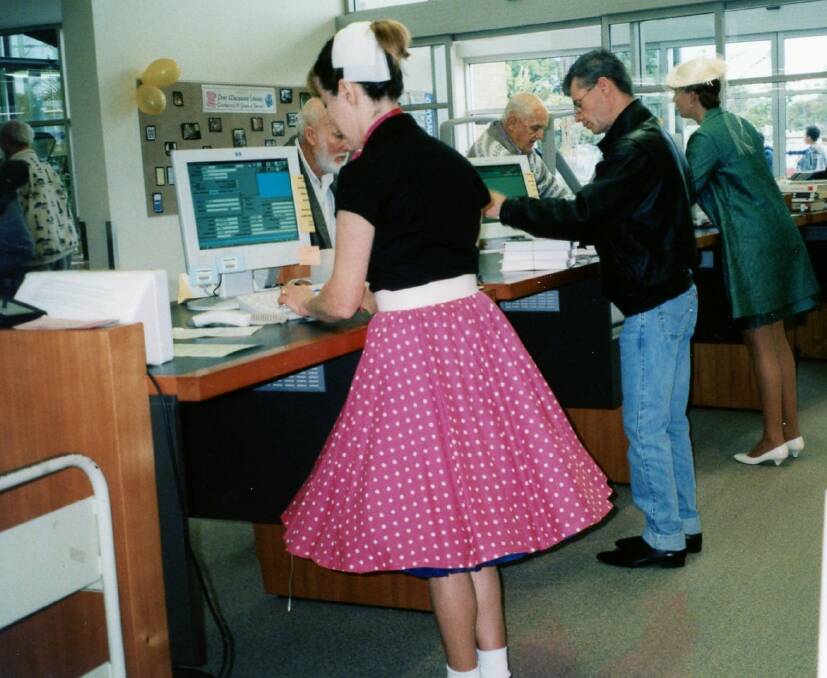 Staff at the library in 2001 dress up to commemorate 50 years of libraries in Port Macquarie. Photo: supplied. 