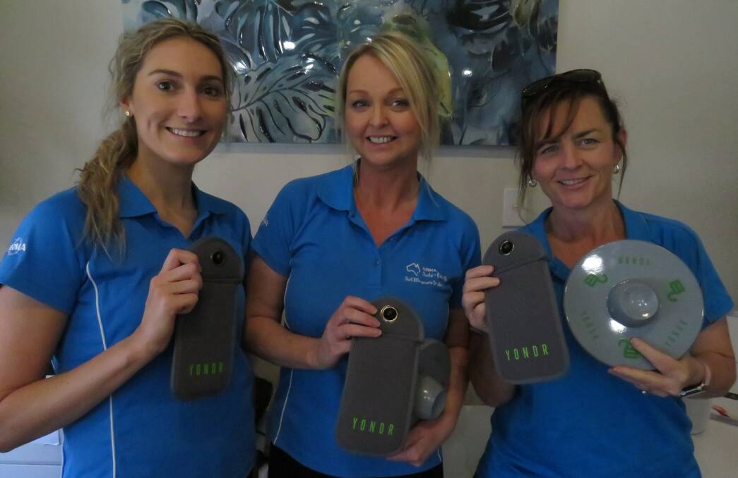 Switching off: Port Macquarie Breakwall Holiday Park staff Tayla Wright, Jane Yates and Dawn Marchment. 