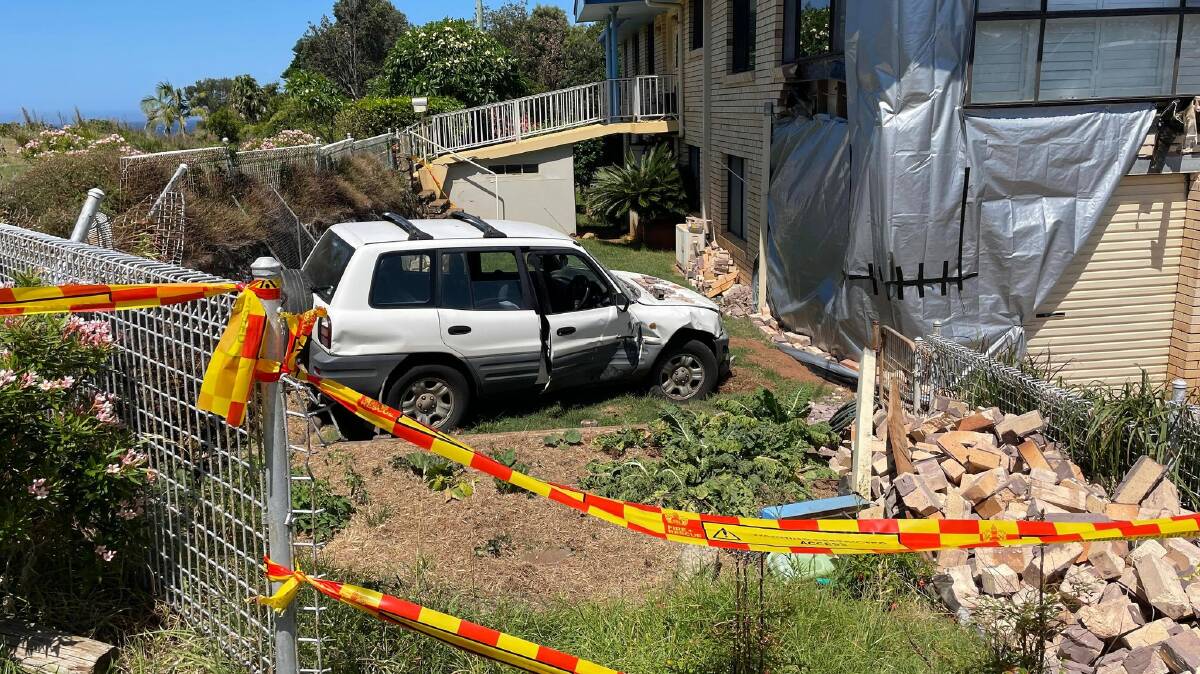 The car went through a fence and crashed into a property on Lighthouse Road. Picture by Liz Langdale 