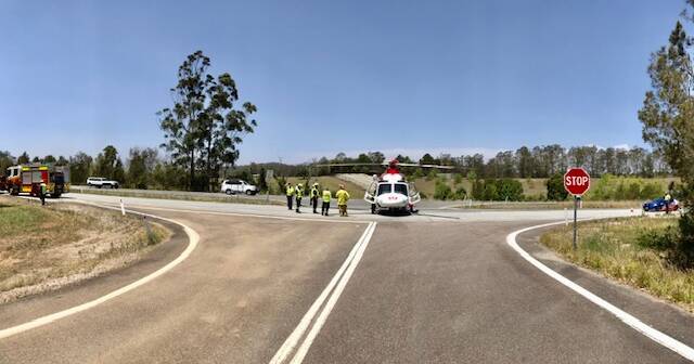 Emergency services on the scene at Pacific Highway, Herons Creek.