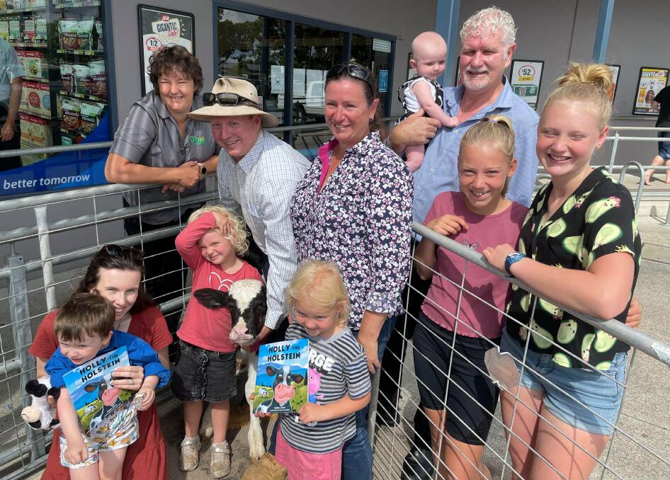 Celebration: The Holly the Holstein book launch was supported by representatives from the Hastings Co-op, farming families and the Mid Coast Dairy Advancement Group at Wauchope IGA on Tuesday, October 26. 