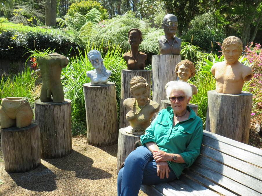 Creative: Nola Stumm with some of her sculptures on display in her garden. 