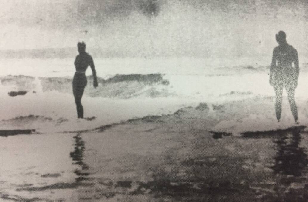 Alrema Becke and Norah McAuliffe surfing a Palm Beach in 1930. . Photo: National Library of Australia. 