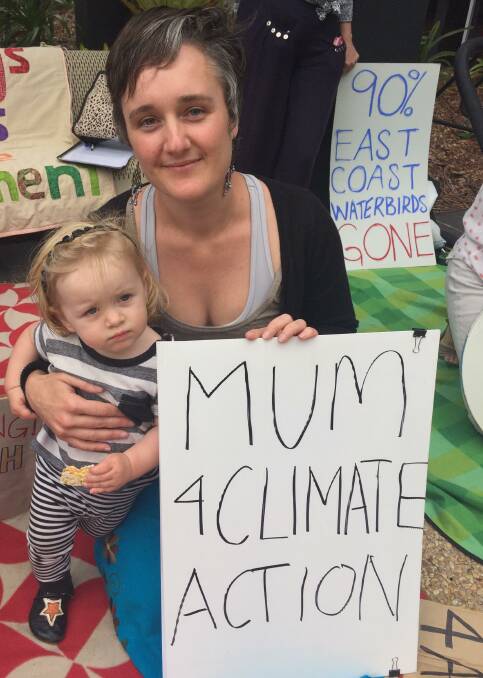 Time for action: Rachel Sheppard with her daughter Lilith outside the Port Macquarie Hastings Council chambers on Wednesday, November 20. 