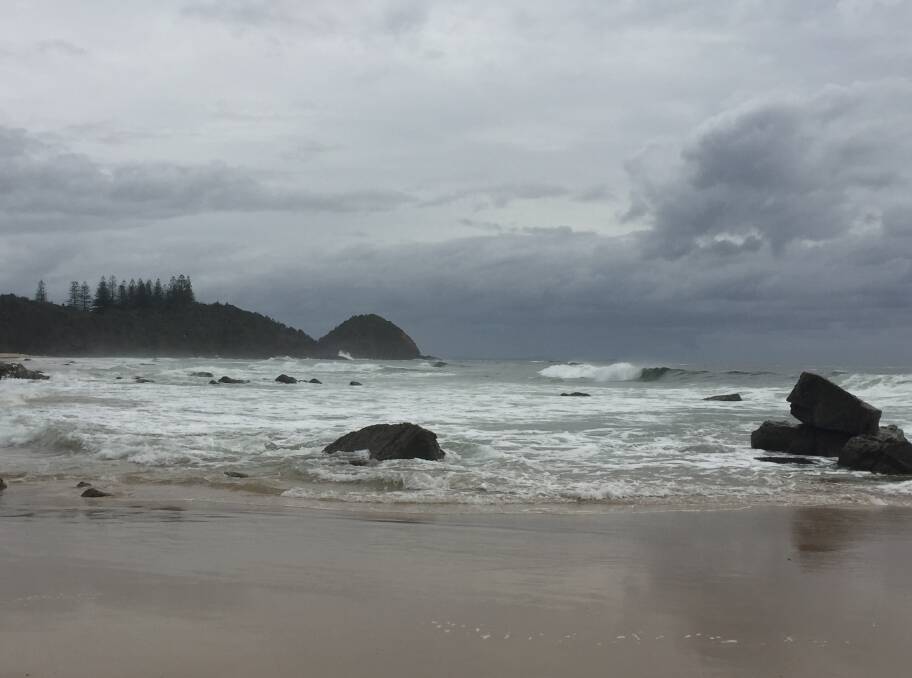Rain clouds roll in over Shelly Beach. 