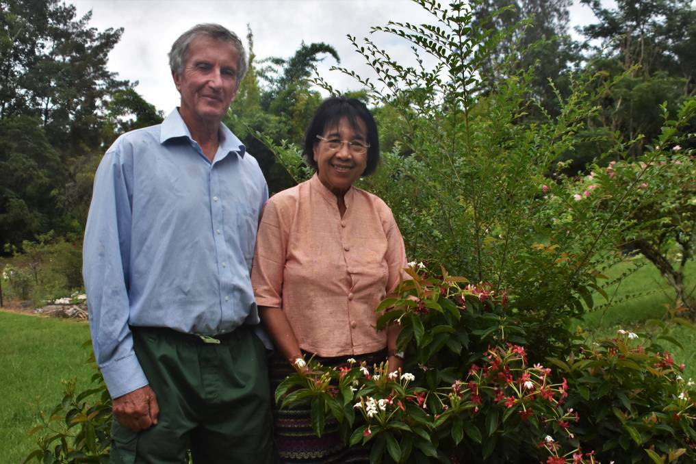 Tin Hta Nu and her husband Ian Oxenford in their garden. Photo: Rob Dougherty. 