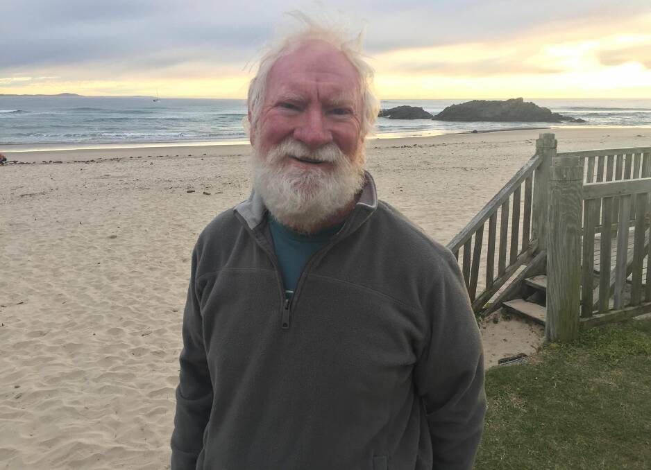 Morning ritual: Port Macquarie's Kenny Little has surfed at Town Beach for over 50 years and will continue to do so. 
