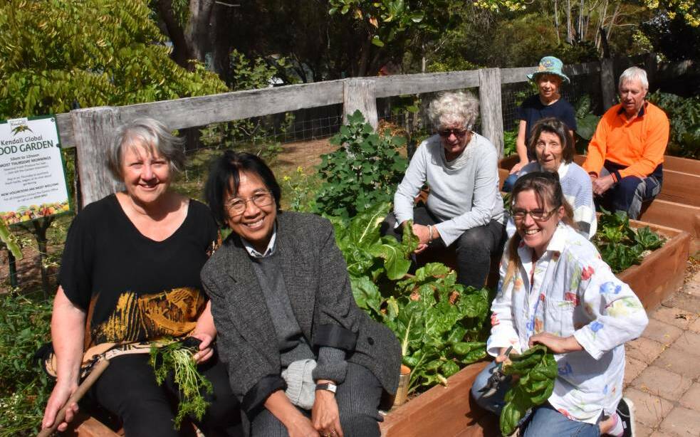 Kendall resident Tin Hta Nu (second from left) is involved in many community organisations including the Kendall Community Garden. Photo: Liz Langdale. 