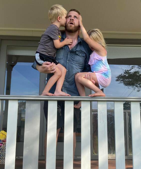 Stir crazy in isolation: Chris Walker with his kids Rocky and Asha. Photo: supplied. 