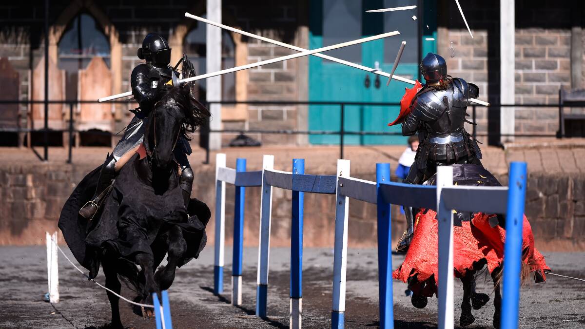 BATTLE: Mieka Leitch (left) takes on her father Phillip Leitch in a joust ahead of the annual Keith Ryall Memorial Jousting Tournament at Kryal Castle this weekend. Picture: Adam Trafford 