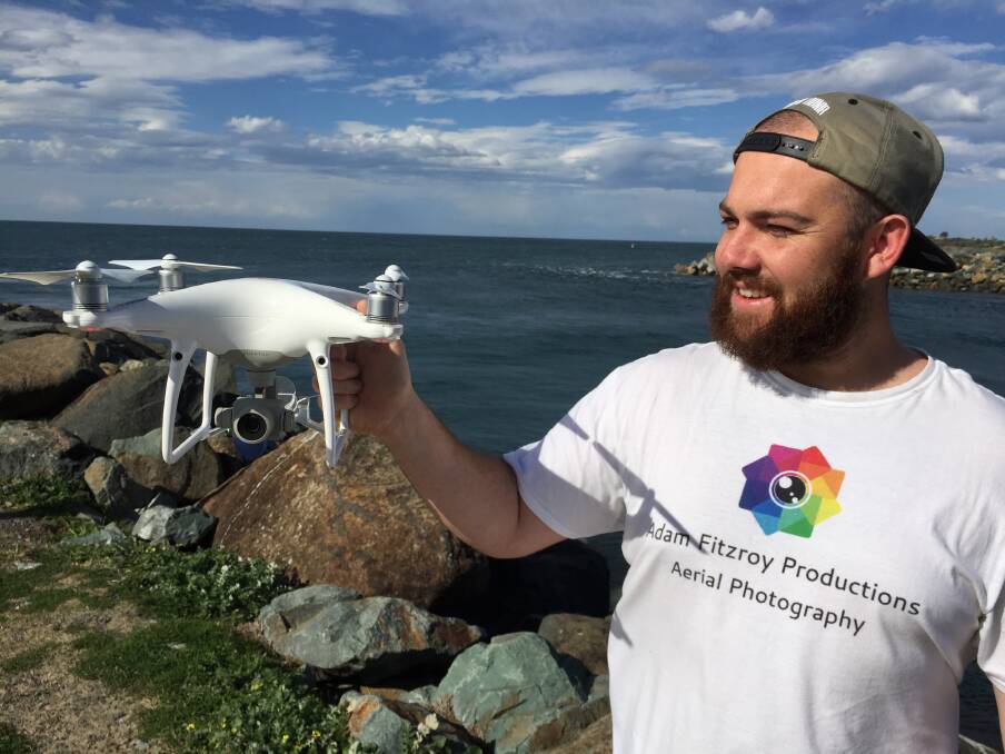 Forster drone operator Adam Fitzroy with his alarm-fitted drone.