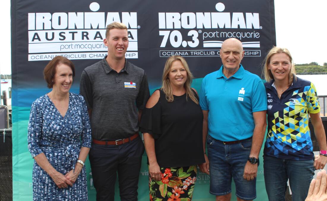 Win for region: Member for Port Macquarie Leslie Williams with Ironman Australia Race Director Ben Herbert, mayor Peta Pinson, chairman of the local organising committee Mike Reid and professional athlete and defending women's champion Laura Siddall.
