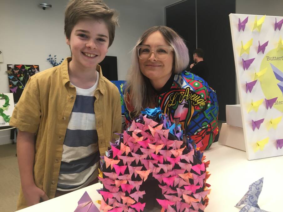 Creatives: The young artist contributing to the project Angus Saidey, 11 of Tacking Point Public school with artist Dee Robb.