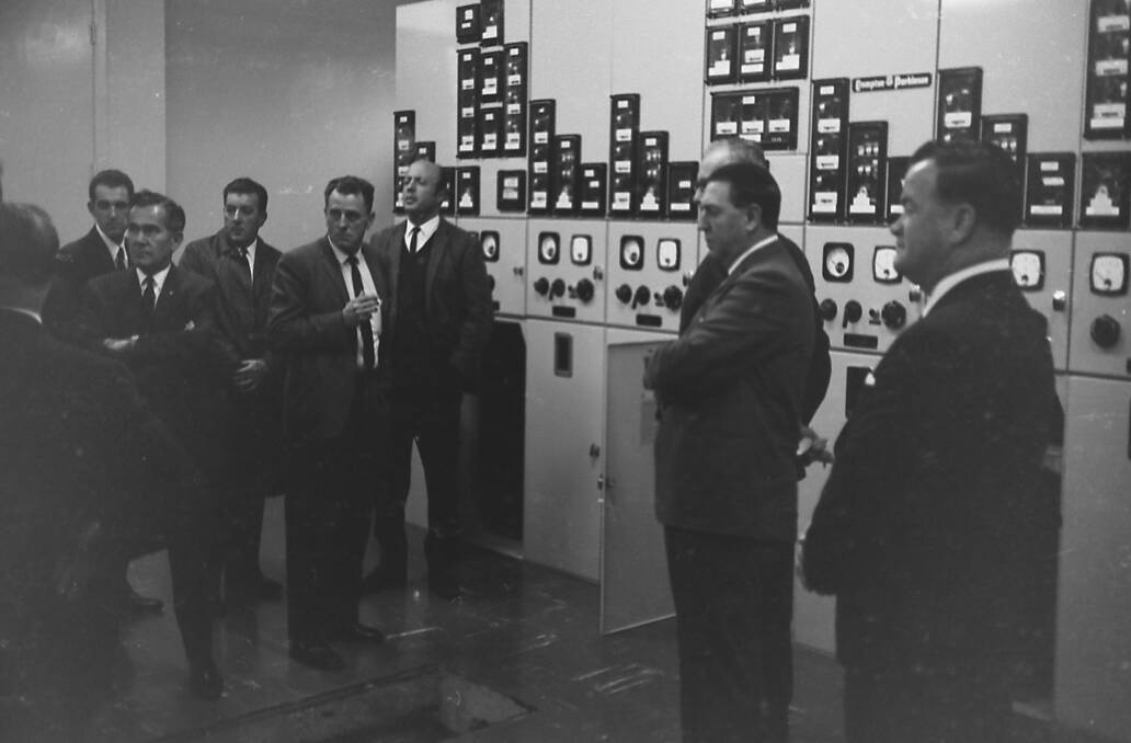 Oxley City County councillors, administrators and members of the construction firm inspect the interior of the new sub-station, 1969.