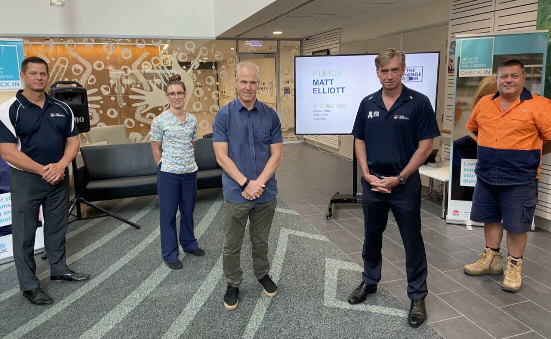 Building capacity: The Change Room mentor Matt Elliott (third from left) with Mid North Coast Local Health District Health, Safety and Wellbeing manager Simon Joice, Port Macquarie Base Hospital Registered Nurse Joanne Roper, MNCLHD Chief Executive Stewart Dowrick and Maintenance Electrician Danny Moss.