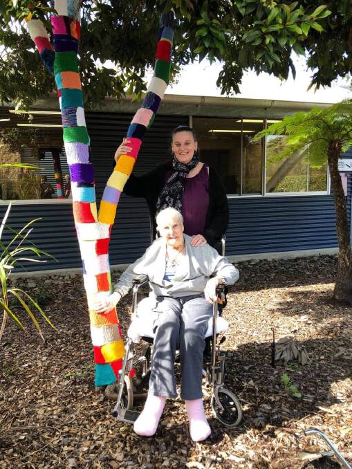 Marjorie Bailey a resident at Emmaus and Sharmain Peterson, an ACFI team member, who have worked together on a yarn bombing project at Emmaus. 