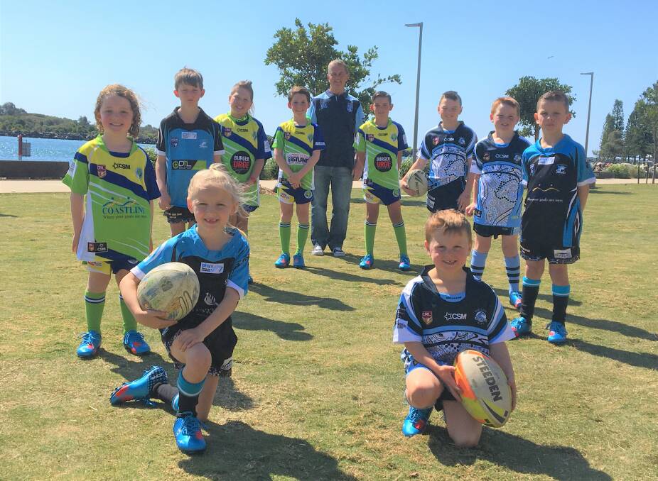 Young stars: NRL great Phil Sigsworth presents new football boots to Charlotte Fraser, Flynn Meyers, Jake Keegan, Jikyha Dungay-Vitnell, Isaac Meyers, Justin Egan, Mason White, Maverick Hyde, Archie McKeough and Korben Hyde. Photo: Tracey Fairhurst.