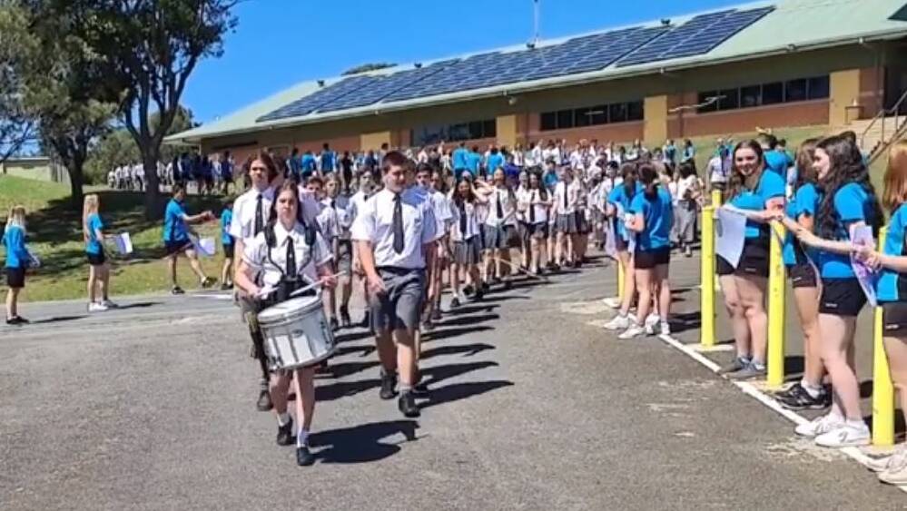 Well done: Students of MacKillop College in Port Macquarie formed a guard of honour between the senior and junior campuses to farewell the class of 2020.