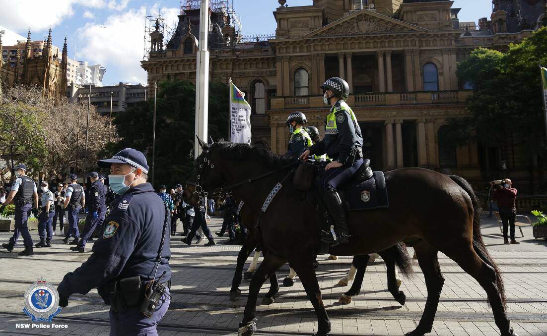 Police on patrol during an unauthorised protest in Sydney's CBD. Photo: NSW Police.