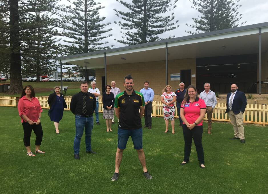 Top effort: All the stakeholders involved in the new Oxley Oval clubhouse celebrate its completion.