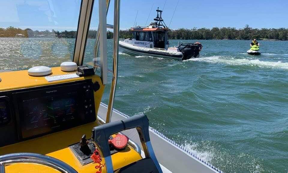 A man died and two others were rescued when their fishing boat capsized on the Hastings River on Friday. Photo: Marine Rescue, Port Macquarie.