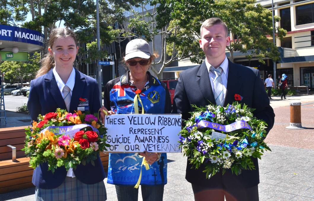 Bridget Flint, Hastings Secondary College Port Macquarie campus school captain and Richie Whitehouse vice captain. Yellow ribbons were placed around the cenotaph in remembrance of returned service personnel who have lost their lives to suicide.