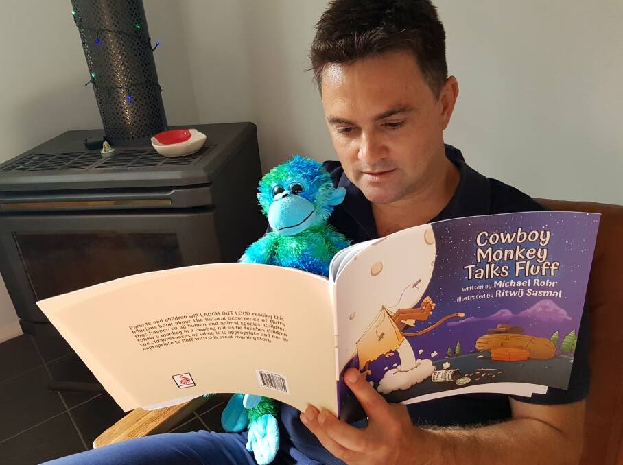 Port Macquarie author Michael Rohr with his new book Cowboy Monkey Talks Fluff.