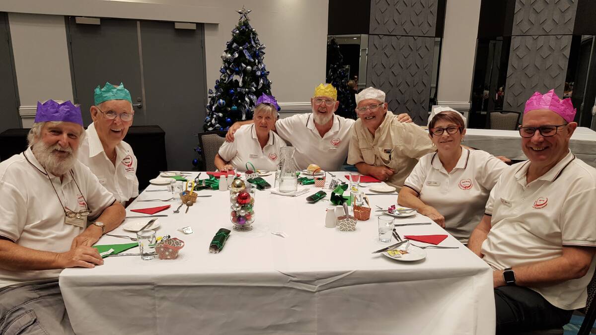 Heart Health NSW volunteers Reg Wilkinson, Ian Watts, Silviya and Peter Winfield, Dennis Bridgeland and Lyn and Adrian Lee-Archer celebrate at the end-of-year Christmas function.