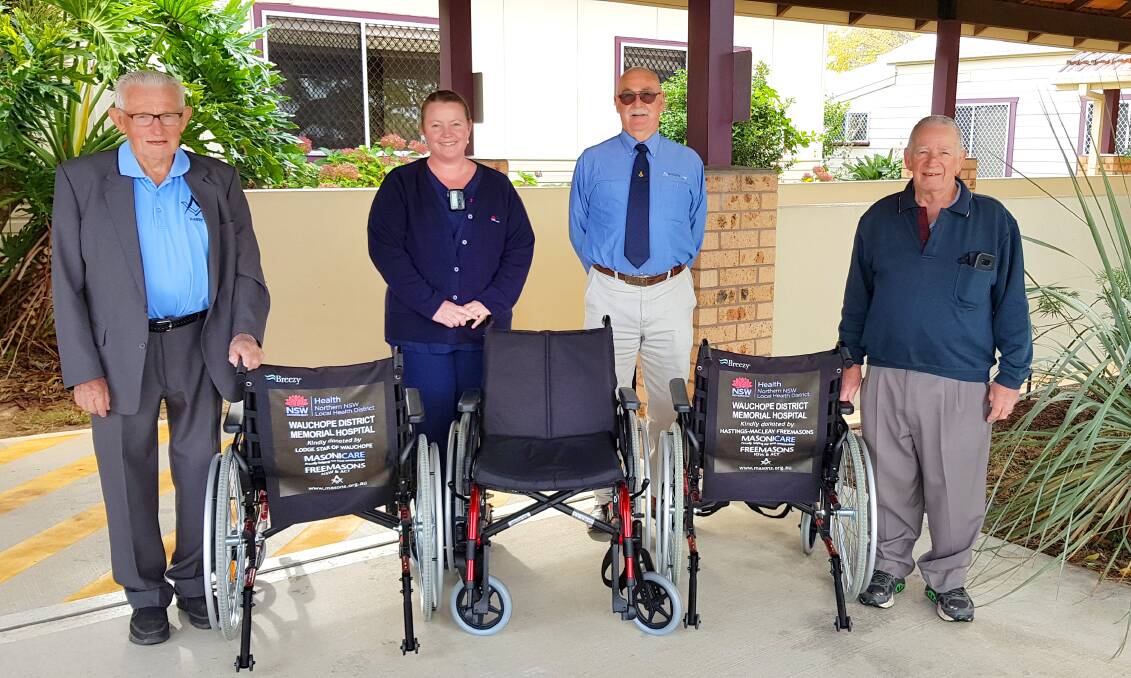 Nursing Unit Manager Kate Williams with three of the six wheelchairs donated to Wauchope Hospital. Representing Lodge Star of Wauchope is Past Master Harry Lavender, Masonicare representative Robert Drysdale and (right) Ray Posner representing Hastings Macleay Freemasons Association.