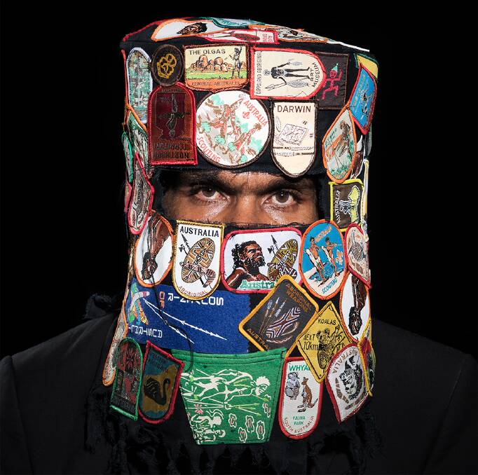Weapons for the Soldier - Glasshouse Regional Gallery. Photo Credit: Tony Albert and Vincent Namatjira, Australias Most Wanted Armed with a Paintbrush, 2018, archival pigment print on paper, found patches, fabric, 100 x 100 cm.Courtesy of the artist and Sullivan + Strumpf, Sydney and Singapore.
Weapons for the soldier is a project by the APY Art Centre Collective and Hazelhurst Arts Centre. The exhibition tour has been assisted by the Australian Government's Visions of Australia program.
