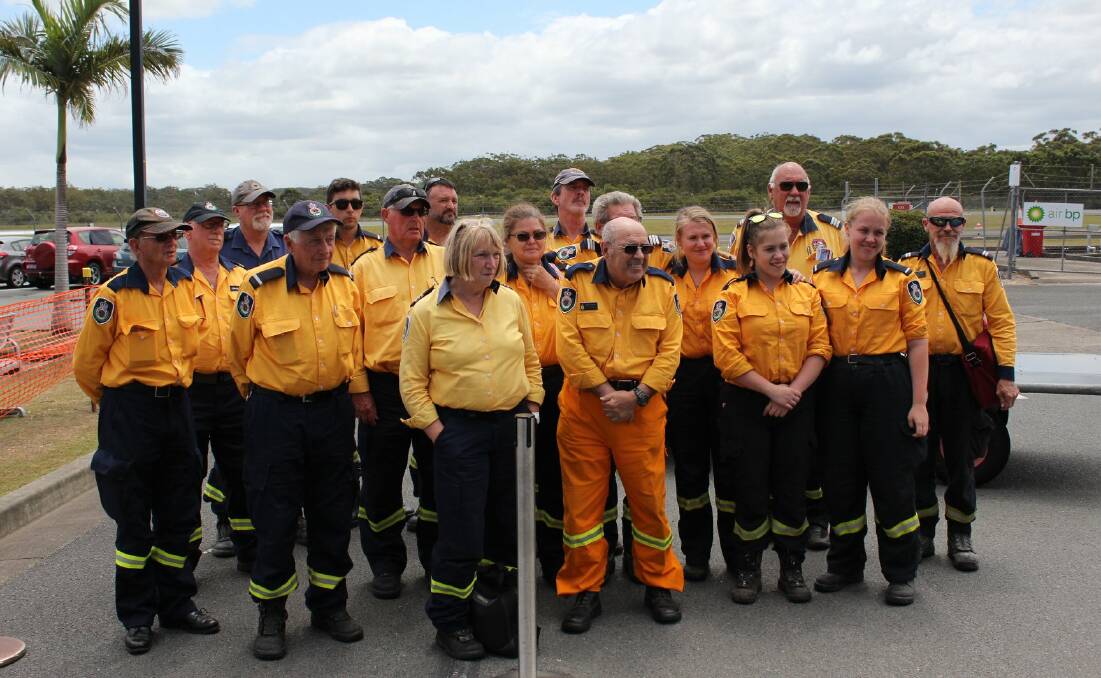 Home safely: Volunteers from the Rural Fire Service Mid Coast District back in Port Macquarie after joining the Queensland fire effort. Photo: NSW Rural Fire Service - Mid Coast District.